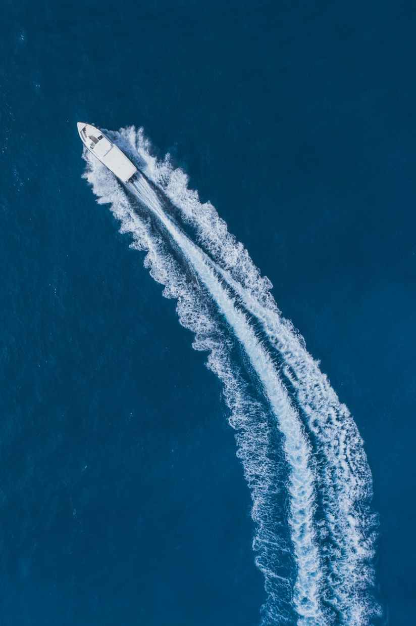 top view photo of speedboat on sea